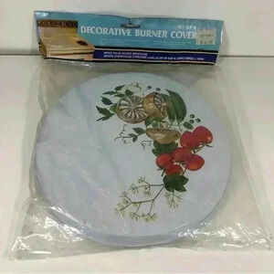 New in  package- set of 4 vintage decorative stove burner covers